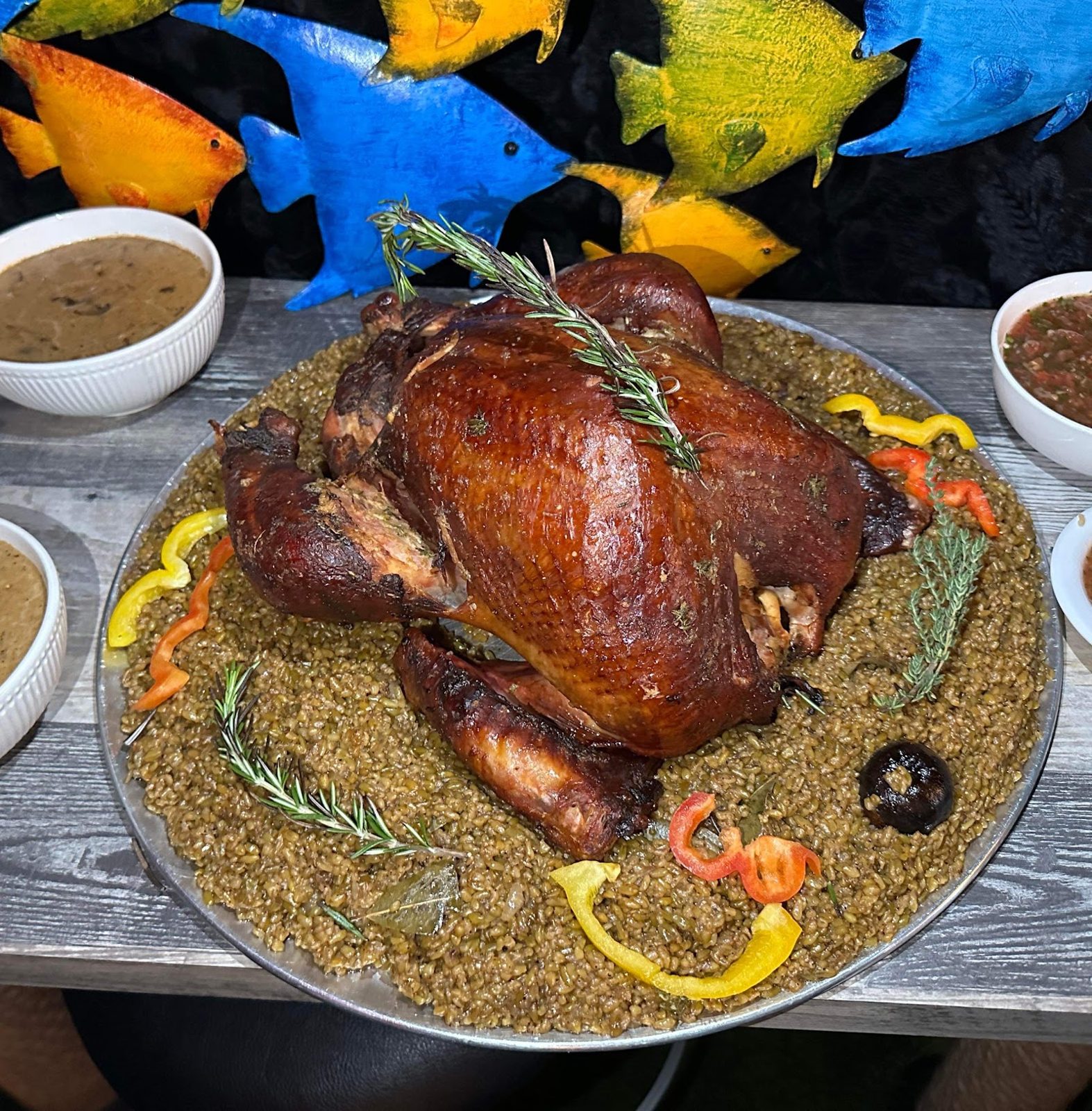 Whole roasted duck on rice